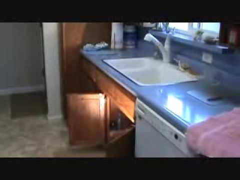 how to find a leak under kitchen sink