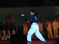 she is sifu Guan's daughter.What she is playing is Dragon Style Boxing.
