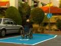 HANDICAPÉ AU STATIONNEMENT