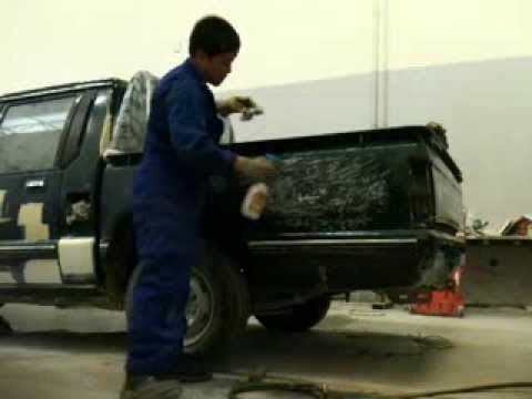 Panel beating of cars: body repair of Mitsubishi L200