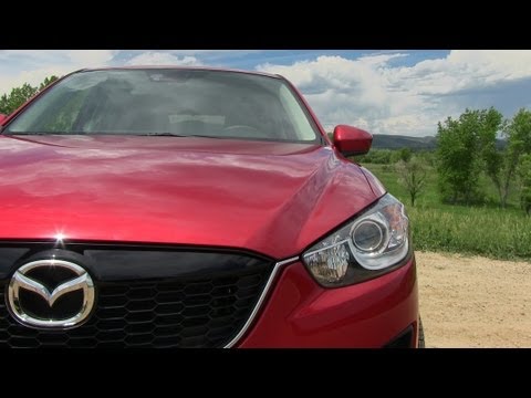 5 0 - ( www.TFLcar.com ) In this episode of The Fast Lane Car, the guy's take the all new Mazda CX-5 Grand Touring AWD to 60 MPH. How fast is it at a mile above se...