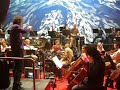 jon & dann watching auckland philharmonic rehearse their score to light surrounding you'