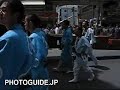One of Kyoto's Big Three Festivals with ornate floats pulled along the streets of Kyoto, Japan in July. Footage shows people pulling a float and later when they turn the corner in front of Kyoto City Hall. Also see photos here: photoguide.jp