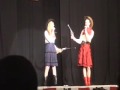Lydia Arsta and Gracen Hill singing at CPA's 8th Grade 