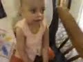 A child operate Tv by remote A child operate Tv by remote