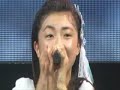 Yurina singing on her own in 2006 concert