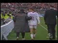 during a match on sun. jan 21 between roma and livorno, totti reacts to a vicious elbow given by the livorno player.