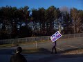 Rudy Arrives to A greeting from Ron Paul Supporters