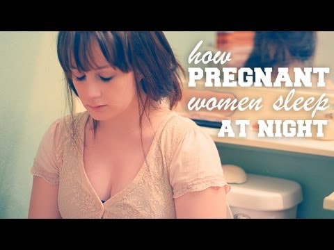 how to lay when pregnant