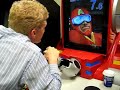 A.B. arm wrestles video game