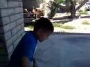 my Nephew on the scooter doing Tricks