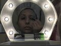 Applying vegan makeup