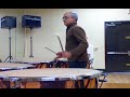 Jose Alicea playing the timpani