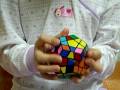 videos de 6 year old solves Megaminx cube in 1:35.49 seconds