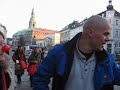 in danish. a woman asks if he would like to donate some money for starving kids in africa when dr. didge shouts out 