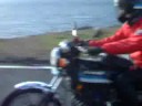 Riding Z400FX at corner.