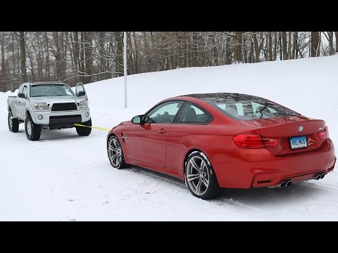 BMW M4 vs Toyota Tacoma Snow Tow BMW M4 vs Toyota Tacoma Snow Tow
