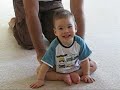at 14 and a half months max was unable to sit. his arms and legs were stiff and when held standing his knees turned inwards, his legs buckled and his feet distorted. he had a rounded back and moderate head control.

max is now 19 months and for the past 5 months nina and bert, max's parents, have been working with peter walker to help max become more flexible and to try to help him back into a more normal pattern of development.

max can now lay comfortably on his tummy, lifting his head with his arms begining to extend. he can sit independently in the first sitting position, and is learning to sit independently in the second. max has good head control and is now learning to stand upright in a normal fashion.
