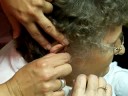 Putting the Hearing Aid Earmold in Your Ear