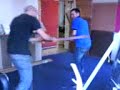 bitch slapping with wood .. ouch !!!!!!!!!