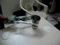 A robotic hand uses to grab an object