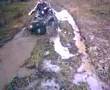ATV Bombardier Traxter Max 500 in the mud
