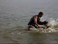 Malinois Nera bite work in lake
