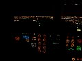 Gulfstream II night landing view from cockpit jumpseat