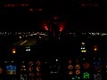Gulfstream II night landing view from cockpit jumpseat