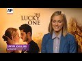 Hollywood heartthrob Zac Efron talks about beefing up to play a marine in romantic drama 'The Lucky One' and shares his love for the genre along with co-star Taylor Schilling. (May 1) Subscribe to the Associated Press: bit.ly Download AP Mobile: www.ap.org Associated Press on Facebook: apne.ws Associated Press on Twitter: apne.ws Associated Press on Google+: bit.ly