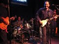 tommy calls artie chavez to play drums as he plays with school of blues musicians.  tommy and john garcia tear it up.