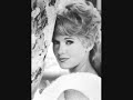 Stevens) and singer Eleanor McGinley. Connie adopted her father's stage name of Stevens as her own. Her parents were divorced and she lived with grandparents. At age eight, she started attending Catholic boarding schools. Actor John Megna was her half-brother. Coming from a musical family, she formed a singing group called The Foremost, in which the other three vocalists -- all males -- went on to fame as The Lettermen. In 1953, Stevens moved to Los Angeles with her father. When she was sixteen, she replaced the alto in a singing group, The Three Debs. She enrolled at a professional school (Georgia Massey's School of Song and Dance in the San Fernando Valley), sang professionally and appeared in local repertory theater. Stevens then started working as a movie extra. After appearing in four B movies, Jerry Lewis saw her in Dragstrip Riot and cast her in Rock-A-Bye Baby. Soon after that, she signed a contract with Warner Brothers. She played 'Cricket Blake' in the popular television detective series Hawaiian Eye from 1959 to 1962, a role that made her famous. Her principal costar was Robert Conrad. In a televised interview on August 26, 2003, on CNN's Larry King Live, Stevens recounted that while on the set of Hawaiian Eye she was told she had a telephone call from Elvis Presley. She didn't believe it, but in fact it was Elvis, who invited her to a party and said that he would come to her house and pick her up personally. They dated for a time and she says they remained <b>...</b>
