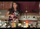 She cooks chicken sauce piquant, adds fresh sausage.