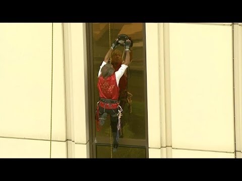 'French Spiderman' Alain Robert climbs Galaxy Macau tower