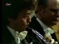 at the height of his career, narciso yepes interprets joaquin rodrigo's masterpiece on his 10-string guitar. the conductor is raphael fr�beck de burgos.
besides the fact that i love this music, this artist, this video is here for several reasons: i'm learning to play this music; mr. bonsillens has regretably disactivated commentary on his version; and i really wanted to pass on the story of how this collaboration between the composer and the guitarist began : 
after an honorable but lackluster start with guitarist regino sainz de la maza, this concerto was not played between 1940 and 1947. then, ataulfo argenta introduced 19-year-old narciso to rodrigo who handed over the score, saying: 