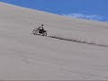 playing around at the various landmarks at st anthony sand dunes in eastern idaho.  Two rmz 450  and one drz 400 hill climbing the sand dunes and screwing around april 06
