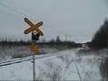 Finnish Express train passes dangerous level crossing