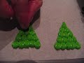 These little decorations made from royal icing are quick and easy to do and look really cute on cupcakes for Christmas.