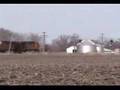 Westbound and eastbound trains meet at Kinsman, IL. 03/22/08