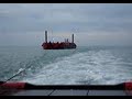 Towing a barge on the Caspian Sea