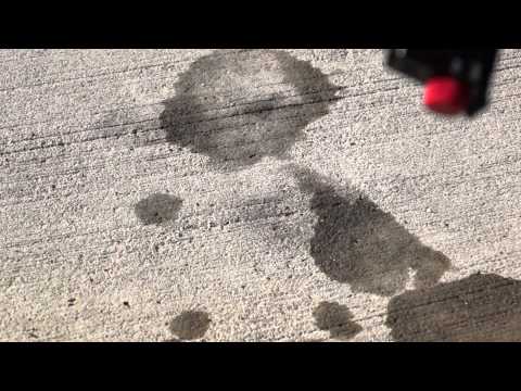 how to remove oil stains from a driveway