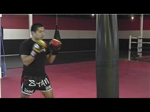 Kickboxing Training : Hitting the Punch Bag
