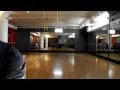 Brandon Jennings indoor sled drive on sliding disks - Place hands on something that slides on the floor.  Towels work well if you dont have the sliding disks.  Put weight on your hands and keep hips in line with your shoulders not much higher.  Run 20 feet then back and try to get 20 reps in the shortest amount of time.   