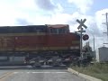 BNSF 5230 west at Crest Hill, IL. Car drives around the fully activated gates! Stupidity caught on film! BNSF 5230 west at Crest Hill, IL. Car drives around the fully activated gates! Stupidity caught on film!