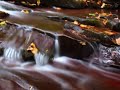will ackerman's climbing in geometry with animation of photos of creeks & cascades.
