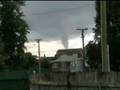 Funnel clouds over Manukau