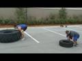 videos de 400 Pound Tire Flip Race