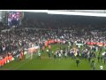 Promoted Leeds players come out to celebrate with the Fans