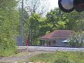 lasta pulled by sp 745 up the grade out of vicksburg, with horn from diesel yard switcher in the background.