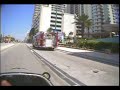 Having survived the bridge descent, I turn south and enjoy the sights on the beach road. Construction cranes and condominimums and decrepit motels li